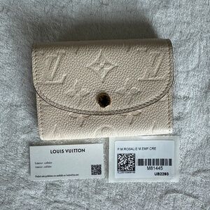 BRAND NEW WITH TAGS CREAM ROSALIE EMPREINTE COIN PURSE / WALLET - M81445